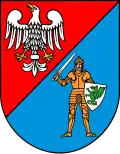 The coat of arms of the Pruszków County.