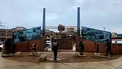 The Packers Heritage Trail plaza with commemorative plaques and statues of Packers players.