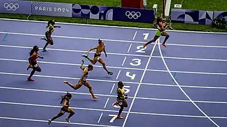 Ta Lou-Smith winning a race in lane 2