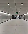 Walkway connecting the escalators to platforms