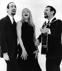 Popular folk trio Peter, Paul and Mary in 1963; Peter Yarrow (right) was a well-known user of the Martin D-28 in its 12-fret variant (in his case, a custom order 1962 D-28S)