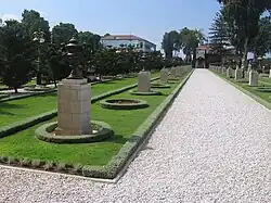 The larger building on the left is the mansion, and the shrine is on the right