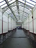 Covered walkway leading from the main station entrance on Princes Street to the concourse and ticket office