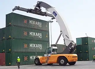 NAWAH equipment stacking containers at the Port of Basra.