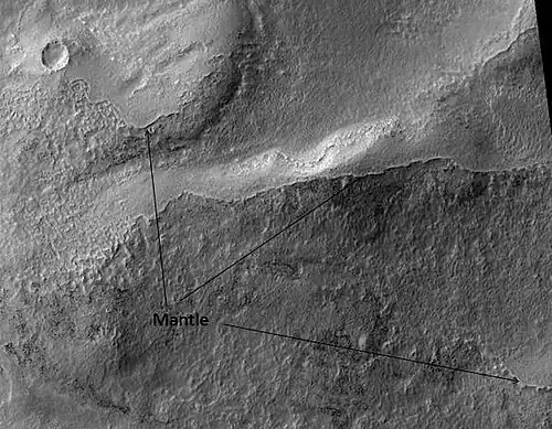 Ptolemaeus crater rim, as seen by HiRISE. Click on image to see excellent view of mantle deposit.