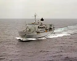 Colour photo of a grey ship