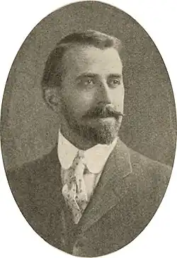 Portrait of Chamberlin with a short beard and mustache