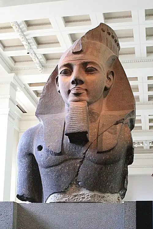 The Younger Memnon (c. 1250 BC), a statue depicting Ramesses II, from the Ramesseum in Luxor (Thebes). Currently on display at the British Museum in London.
