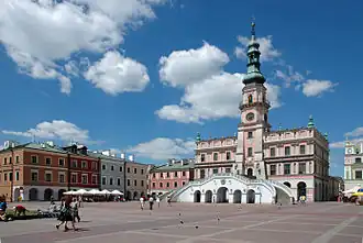 Zamość City Hall, designed by Bernardo Morando, is a unique example of Renaissance architecture in Europe, consistently built in accordance with the Italian theories of an "ideal town".[282]