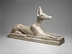 Recumbent Anubis; 664–30 BC; limestone, originally painted black; height: 38.1&nbsp;cm, length: 64&nbsp;cm, width: 16.5&nbsp;cm; Metropolitan Museum of Art