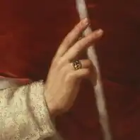 A detail of a painting showing a ringed hand, belonging to Pius VIII