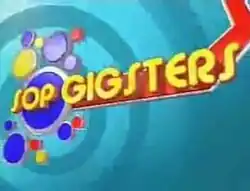 An image with circle objects, over a teal background. The show title is displayed on the center of the image.