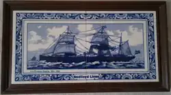 A pair of commemorative Delftblue tiles issued by Nedlloyd showing SS Prinses Amalia