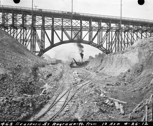 The Dearborn Regrade in progress, 1912. Looking west, towards the 12th Avenue South Bridge/Jose P. Rizal Bridge, constructed the previous year.