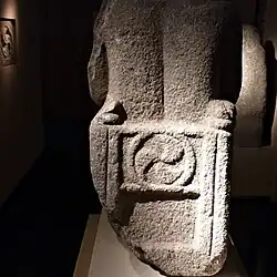 Back of a sitting statue