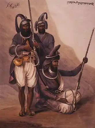 Nihang Abchal Nagar, turban-wearing Sikh religious warriors with chakrams.