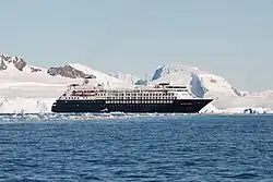 Photograph of a cruise ship off the Antarctic coast
