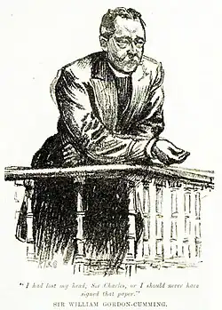 Gordon-Cumming wearing a frock coat, leaning on the dock while giving evidence