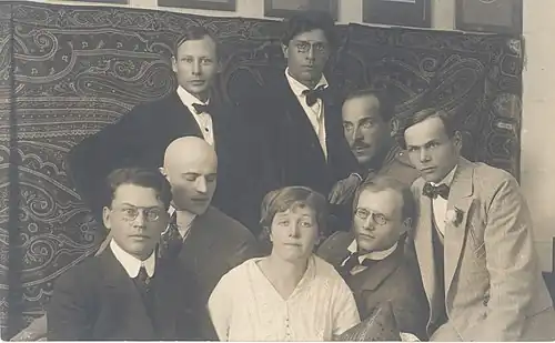 Members of the Estonian Siuru literary circle in 1917, rear: Peet Aren, Otto Krusten, and Johannes Semper. front row: Friedebert Tuglas, Artur Adson, Marie Under, August Gailit, and Henrik Visnapuu