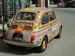 A Fiat 500 painted in the carretto style