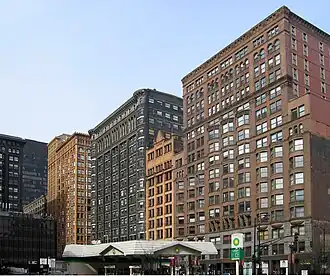 The Manhattan Building (right) is the oldest surviving skyscraper in the world to use a purely skeletal supporting structure.