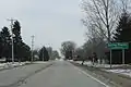 Looking east at the sign for Spring Prairie on WIS11
