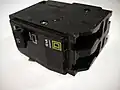 A modern 20-ampere double-pole Square&nbsp;D circuit breaker.