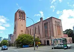 Rear/side view of cathedral. A secondary entrance is near the bell tower.