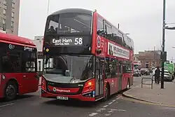 Left side photograph of red Volvo BZL double-decker bus