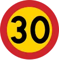 Swedish 30&nbsp;km/h speed limit – the yellow background provides a contrast in case snow covers the background against which one perceives the road sign.[39]
