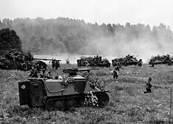 A Pbv 301 with dismounted infantry