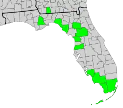 Map of Georgia and Florida with county boundaries and distribution of Symphyotrichum fontinale shaded in green: Georgia counties — Grady; Florida counties — Alachua, Citrus, Collier, Dixie, Lee, Liberty, Marion, Miami-Dade, Monroe, Pasco, and Taylor