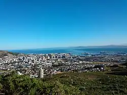 Cape Town and Table Bay from the slopes of Devil's Peak, showing some of the mountain biking jeep tracks.