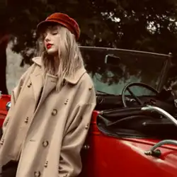 Cover of "Message in a Bottle" showing Swift in a beret and trench coat; behind her is a red convertible
