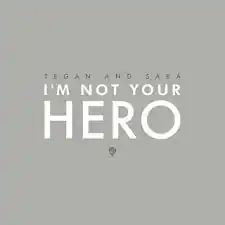 Over a gray-colored background, a small-sized Warner Brothers logo is placed under text displaying the song's name and artist.