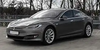 A front-three quarter view of a gray Model S