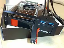 A dual-HDD rack, made as a 5.25-inch-bay device capable of simultaneously holding a 2.5-inch and a 3.5-inch SATA HDD, with two additional USB&nbsp;3.0 ports