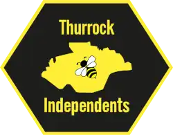 A hexagon with a map of Thurrock inside it. Inside the map is a picture of a bee.