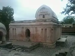 Trivikrama Temple with its chaitya arch.