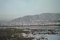 View across the river from Tumen city in China to the town of Namyang in North Korea