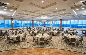 A view from the stage of Founders Hall, the university's main ballroom, prepared for a banquet