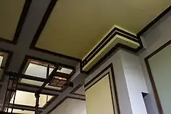 Detail of one of the piers, with a ceiling skylight visible at left