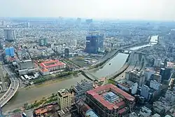 Aerial view of the Saigon bank building (bottom center) and the Rạch Bến Nghé canal