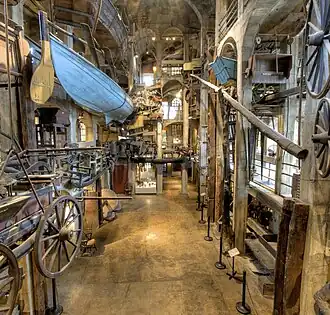 Inside the Mercer Museum. Pieces hang from the ceiling and walls.