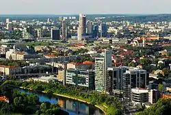 Victoria Tower can be seen in the foreground, the tallest among the row of office buildings.