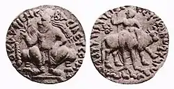 Vima seated on a throne, holding a thunderbolt.