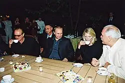 President Putin meeting with participants in the 23rd Moscow International Film Festival. With actors Jack Nicholson, Peta Wilson and the festival's president, Nikita Mikhalkov (left to right).