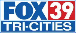 In a white box with blue trim: The Fox network logo in blue. To the right, a white 39 in a red box. Beneath both, in a blue-box, the word "Tri-Cities" all caps in a different sans serif.