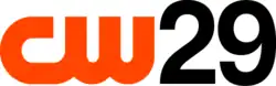 The CW logo in burnt orange next to a black "29".
