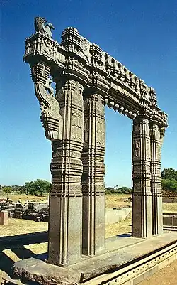 Kakatiya Kala Thoranam (Warangal Gate) built by the Kakatiya dynasty in ruins; one of the many temple complexes destroyed by the Delhi Sultanate.[69]